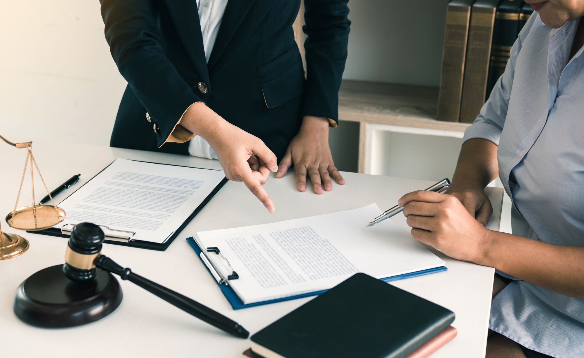 Business lawyer is currently counseling the client's trial at the lawyer office.